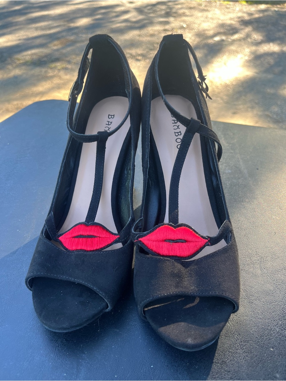 BAMBOO Black T-Strap Peep-Toe Heels with Red Lip Appliqué
